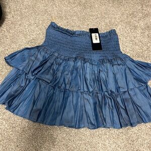 Boutique denim blue colored skirt brand new